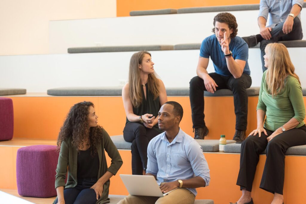 group of people sitting on in lecture room
